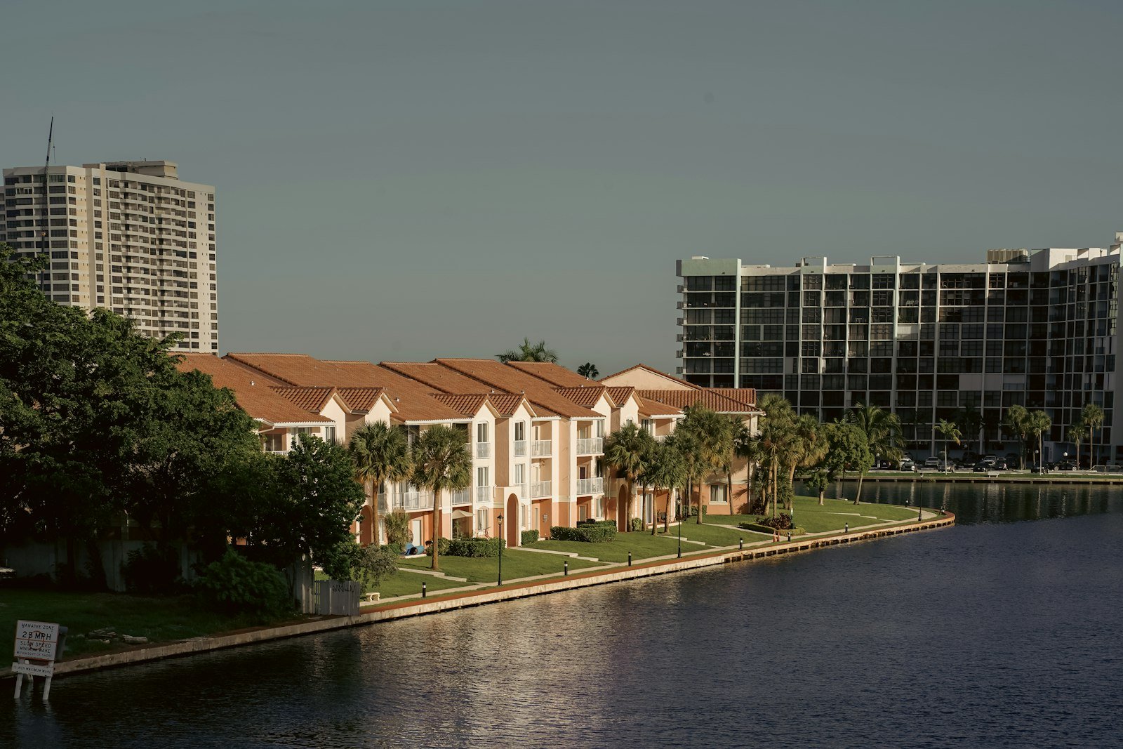 a building next to a body of water